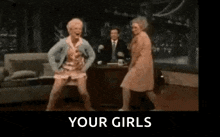 two older women are dancing in front of a man in a room .