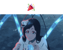 a girl with a party popper on her head is holding a globe