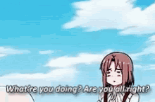 a girl is talking to another girl and says what are you doing are you all right