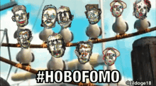 a bunch of birds hanging on a wire with the hashtag #hobofoma on the bottom