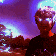 a boy wearing a t-shirt that says yt9m3