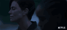 a netflix ad shows a woman looking at another woman