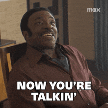 a man in a brown shirt says now you 're talkin