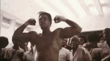 Muscles Up GIF - Will Smith Muhammad Ali Movie GIFs