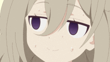 a close up of a girl with a purple eye