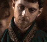 a close up of a man 's face with the words lord-aldhelm gifs on the bottom right