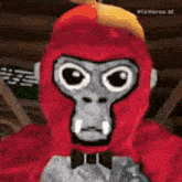 a red gorilla is wearing a bow tie and a red mask .