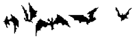 a set of four pixelated bats flying in different directions