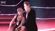a man and a woman are standing next to each other with the word [ as ] visible in the corner