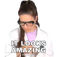 a woman is wearing glasses and a lab coat and says it looks amazing .