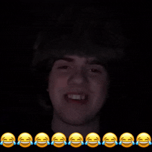 a row of smiley faces with tears on them