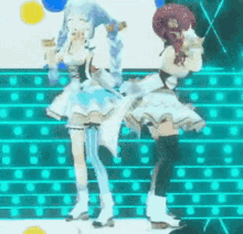 two anime girls are dancing on a stage with blue lights behind them