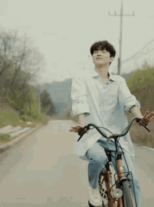 The Boyz Changmin GIF - The Boyz Changmin Riding Bike GIFs