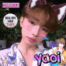 a picture of a boy with cat ears and the words yaoi
