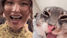 a woman is smiling next to a cat with its tongue hanging out .