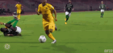 a group of soccer players are playing a game on a field