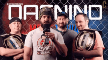 a group of men are standing in front of a sign that says ' dashino ' on it