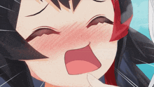 a close up of a girl 's face with her eyes closed