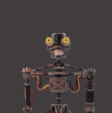 a close up of a robot 's eyes with yellow circles