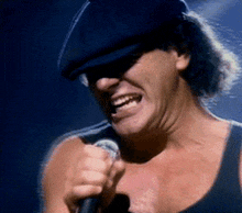 Singer-brian-johnson Rock-band-geordie GIF - Singer-brian-johnson Rock-band-geordie 1986-song-who-made-who GIFs