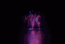 a computer generated image of a fountain with purple and blue lights coming out of it