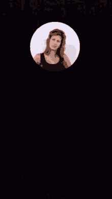 a woman 's face is shown in a circle on a dark background