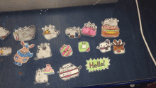 a bunch of drawings on a table with one that says hello