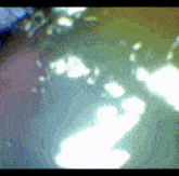 a blurry image of a person 's shadow on the ground
