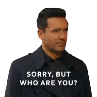 a man in a trench coat is asking who are you