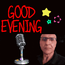 a man stands in front of a microphone with the words good evening written above him