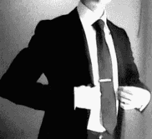 Cleans Up Good GIF - Cleanup Suit Tie GIFs