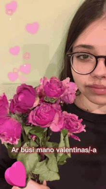 a girl with glasses is holding a bouquet of pink roses with the words ar busi mano valentinas / a below her