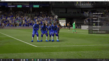 a soccer game is being played with a score of 1-0