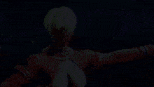 a woman with white hair and bracelets on her wrists is in a video game
