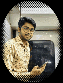 a man in a floral shirt is holding a cell phone