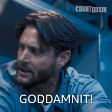 a man with a beard says goddamnit in a countdown advertisement