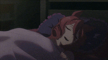 a girl with red hair is sleeping in a bed with a purple pillow