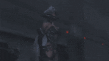 a video game character is holding a red sphere in her hands .
