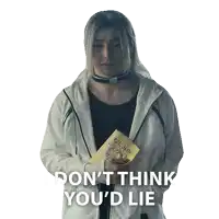 a man in a white jacket is holding a book and says " i don 't think you 'd lie "
