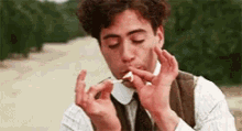 Blow Smoke GIF - Blow Smoke Robert Downey Jr GIFs