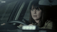 a woman driving a car with the words i 'd rather not talk about that behind her