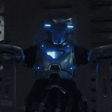 a robot with glowing eyes is standing in a dark room