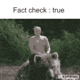 a picture of a man riding a bear that says " fact check true "