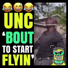 a man is holding a bottle of street juice in front of a sign that says ' bout to start flyin ' .
