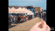 a painting is being painted on a canvas and the words made in animatica are on the bottom