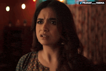 a close up of a woman 's face with the words pranay_varma on the bottom right
