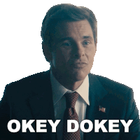 a man in a suit and tie says " okey dokey " on a white background