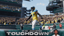 a football player named jahan dotson is jumping in the air on a field