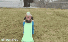a child is playing on a slide with a gifson.net watermark