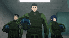 a group of soldiers are standing in a hallway and one of them has a helmet on
